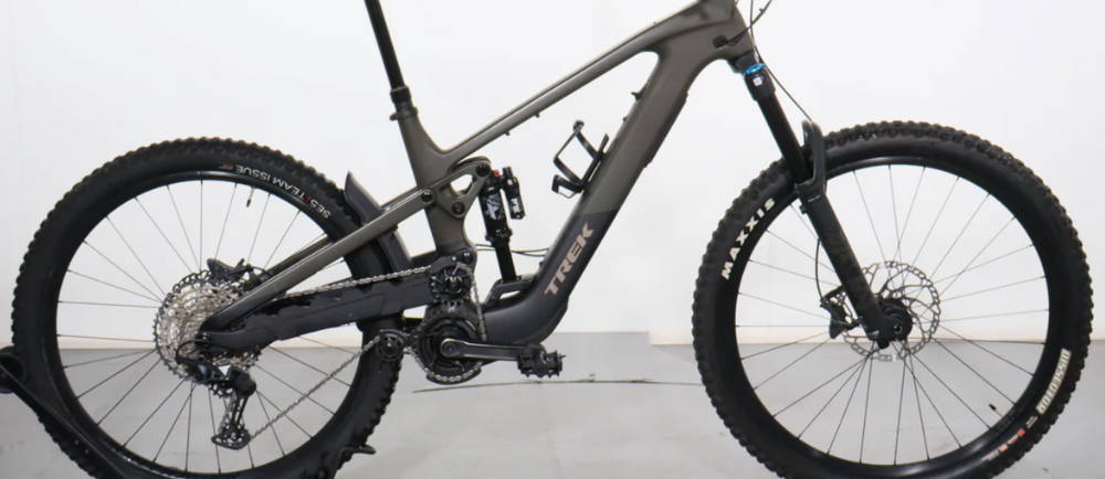 a grey Trek Slash+ 9.7 full suspension electric mountain bike