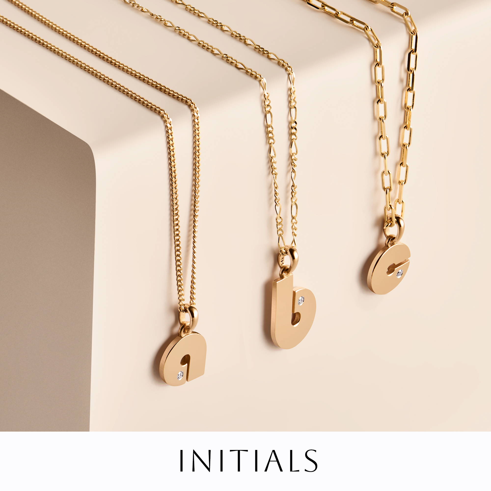 14 Karat Gold Initial Pendants With Real Diamond Embedded In Each Piece 