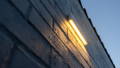 Exterior wall light illuminating brickwork at Westbourne SA