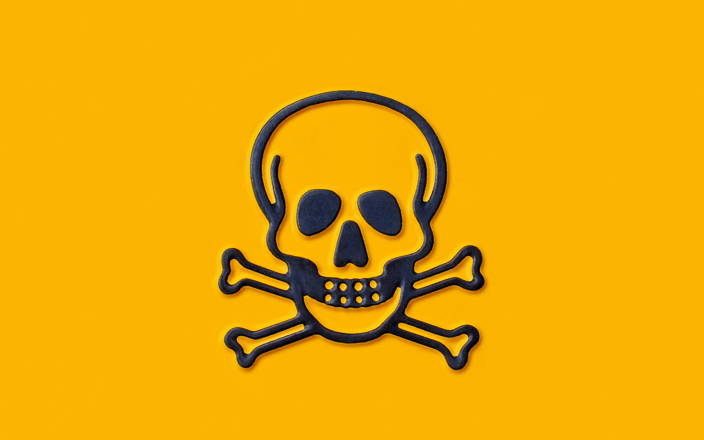 Black skull outline on yellow background (preview)