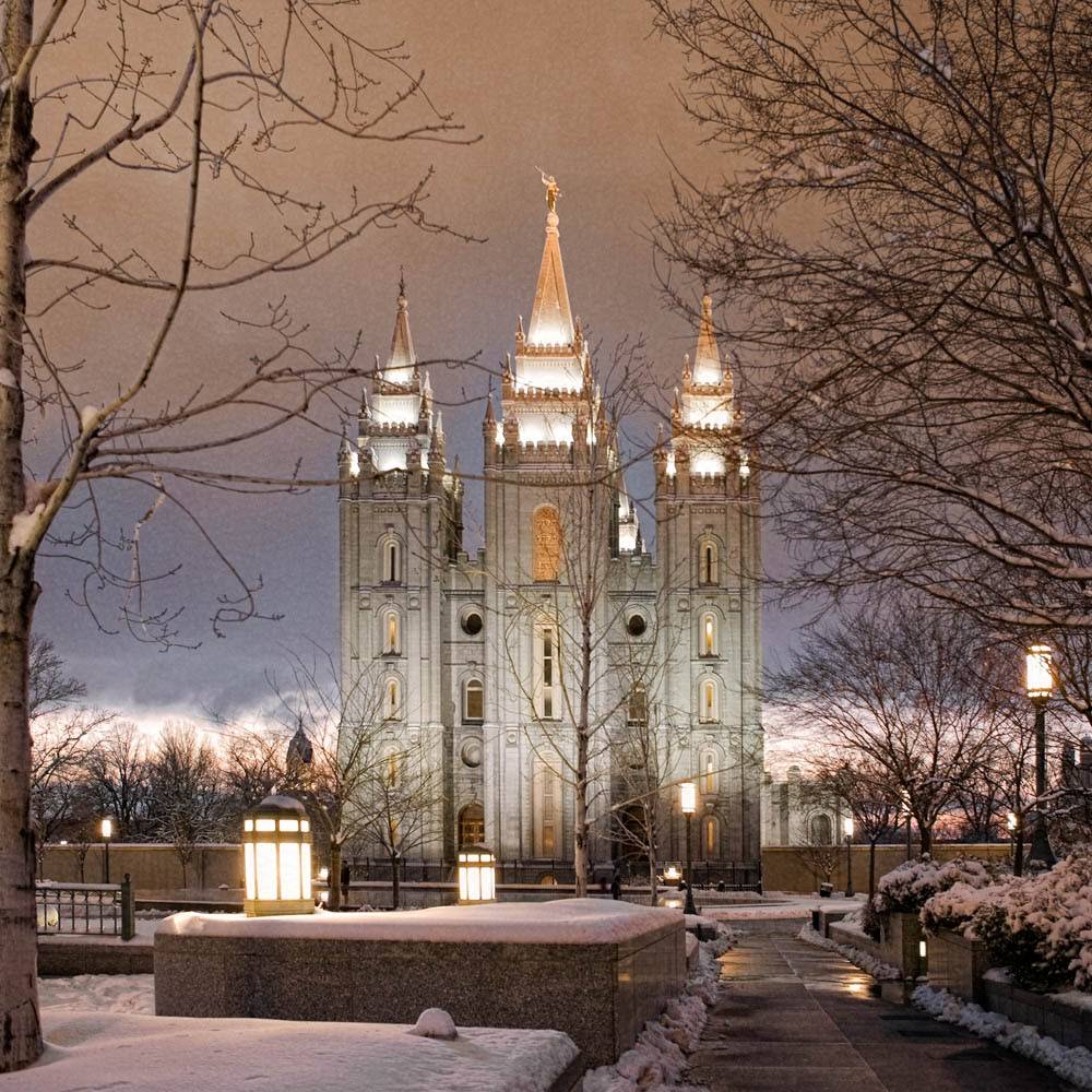 Salt Lake Temple grounds covered in a recene snowfall.