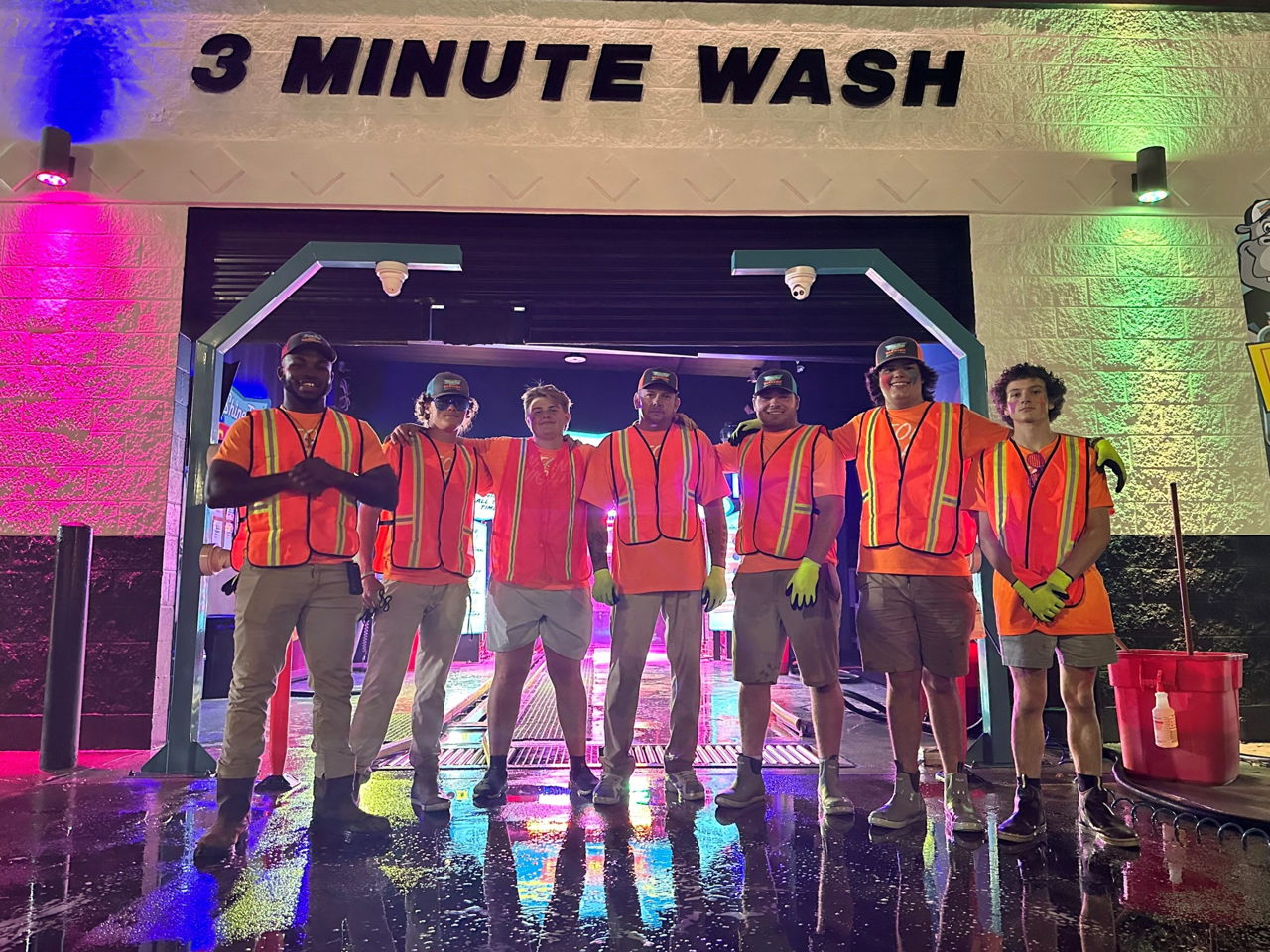 The Shine Time team lined up in front of the wash