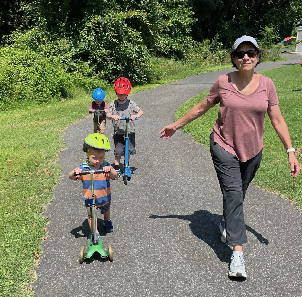 Randee on a walk with her 3 grandkids