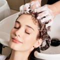 Salon hair treatment in the shampoo bowl