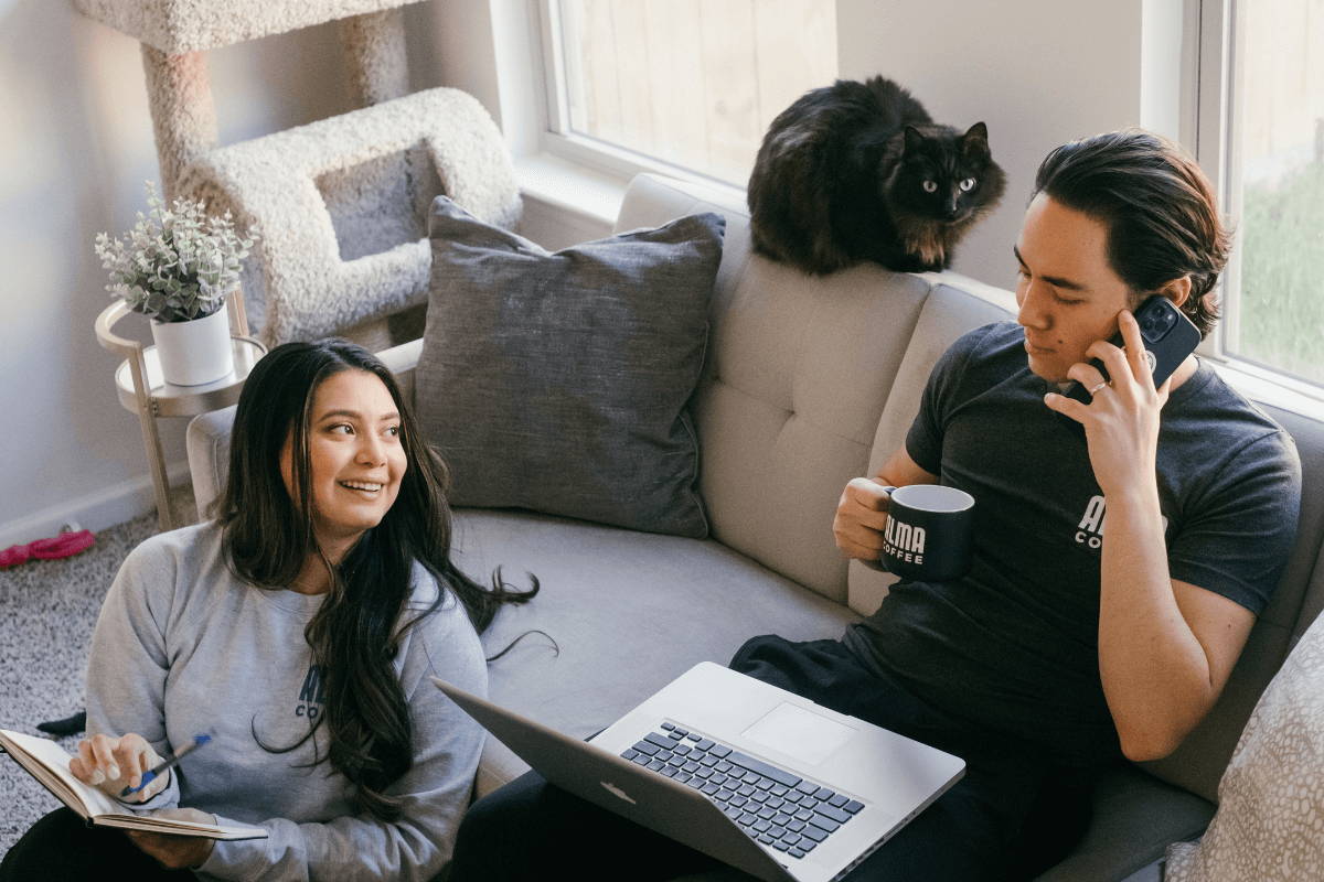 Man and woman searching on computer.