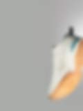 Close-up of a pair of classic white tennis shoes