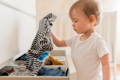 Toddler finding what to wear.