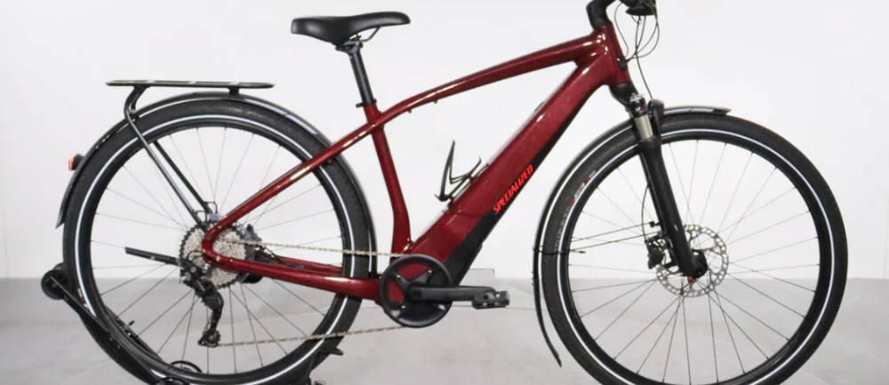 a red Specialized Turbo Vado 4.0 electric city bike