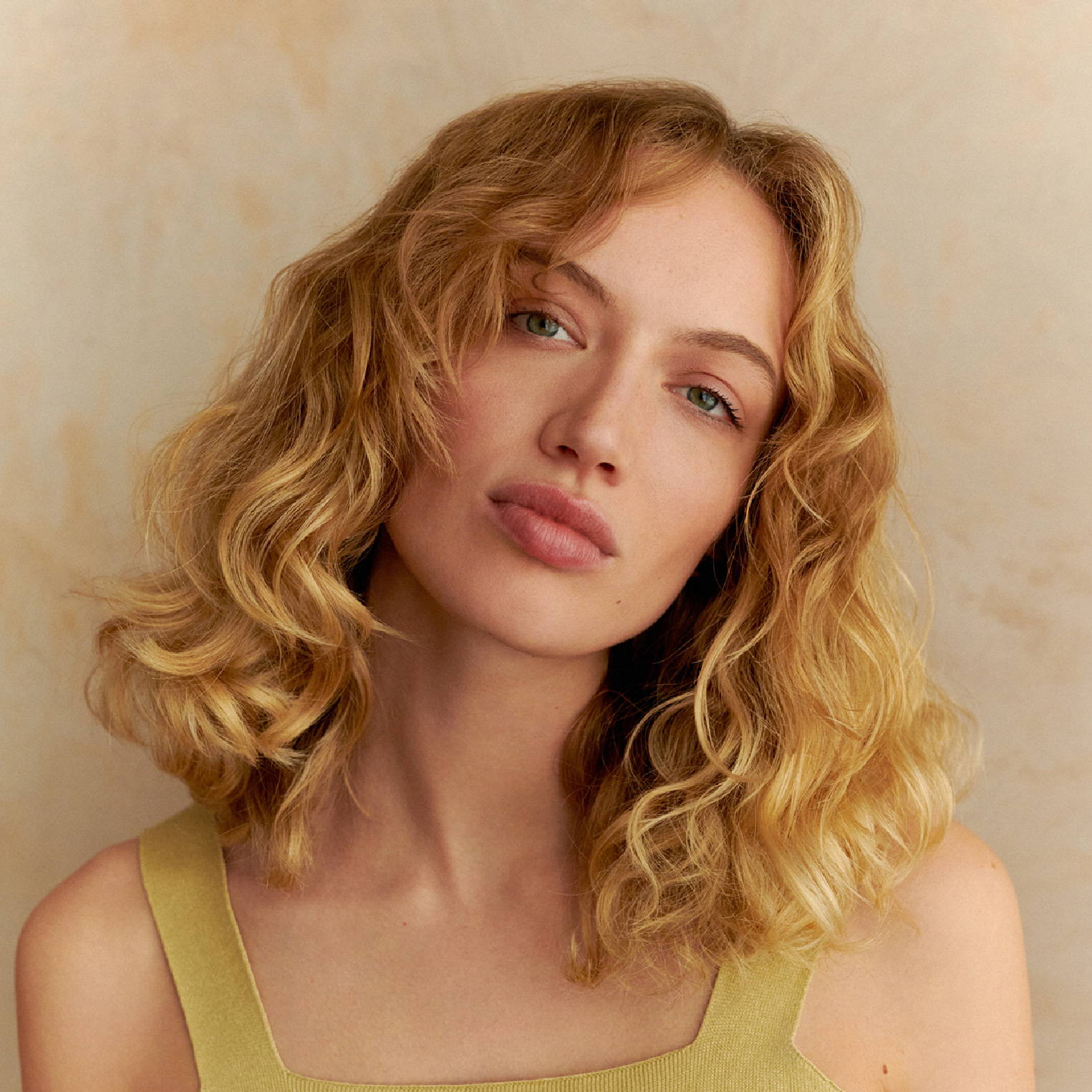 woman with shoulder-length curls