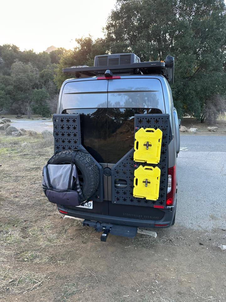 Storyteller Overland NVADER rack being used to carry a spare tire and extra gas.