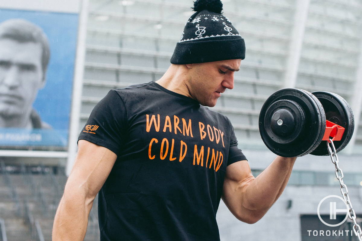 WBCM soccer player performing exercises with dumbbell