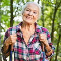 active-elderly-female-hiking-in-woods