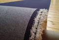Rouleaux de tissus recyclés pour la fabrication d’un jean