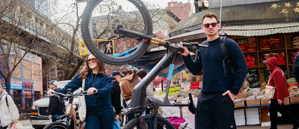 A man on an e-Bike in Chinatown