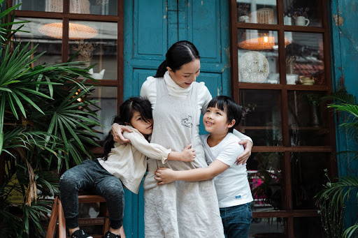 A mother hugging her daughter and son - Photo by Ketut Subiyanto from Pexels