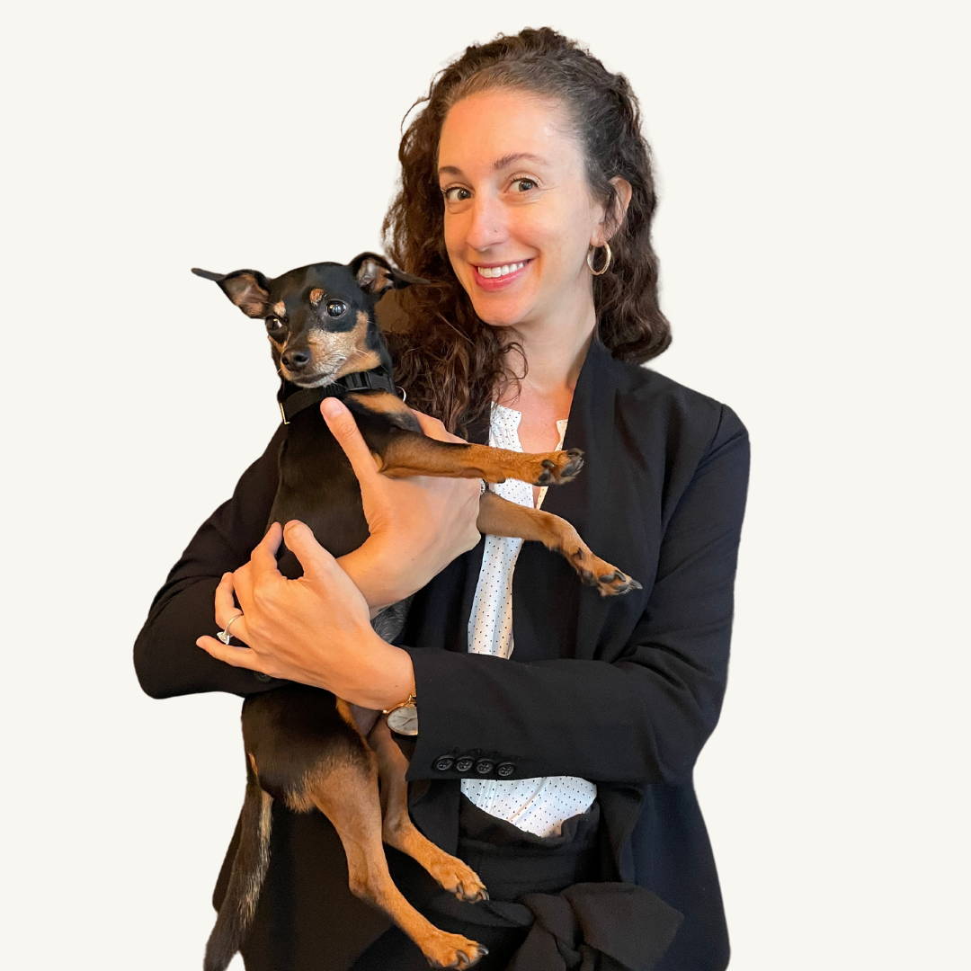 Lindsay Carvalho founder of opal pets vegan dog supplement with small rescue dog