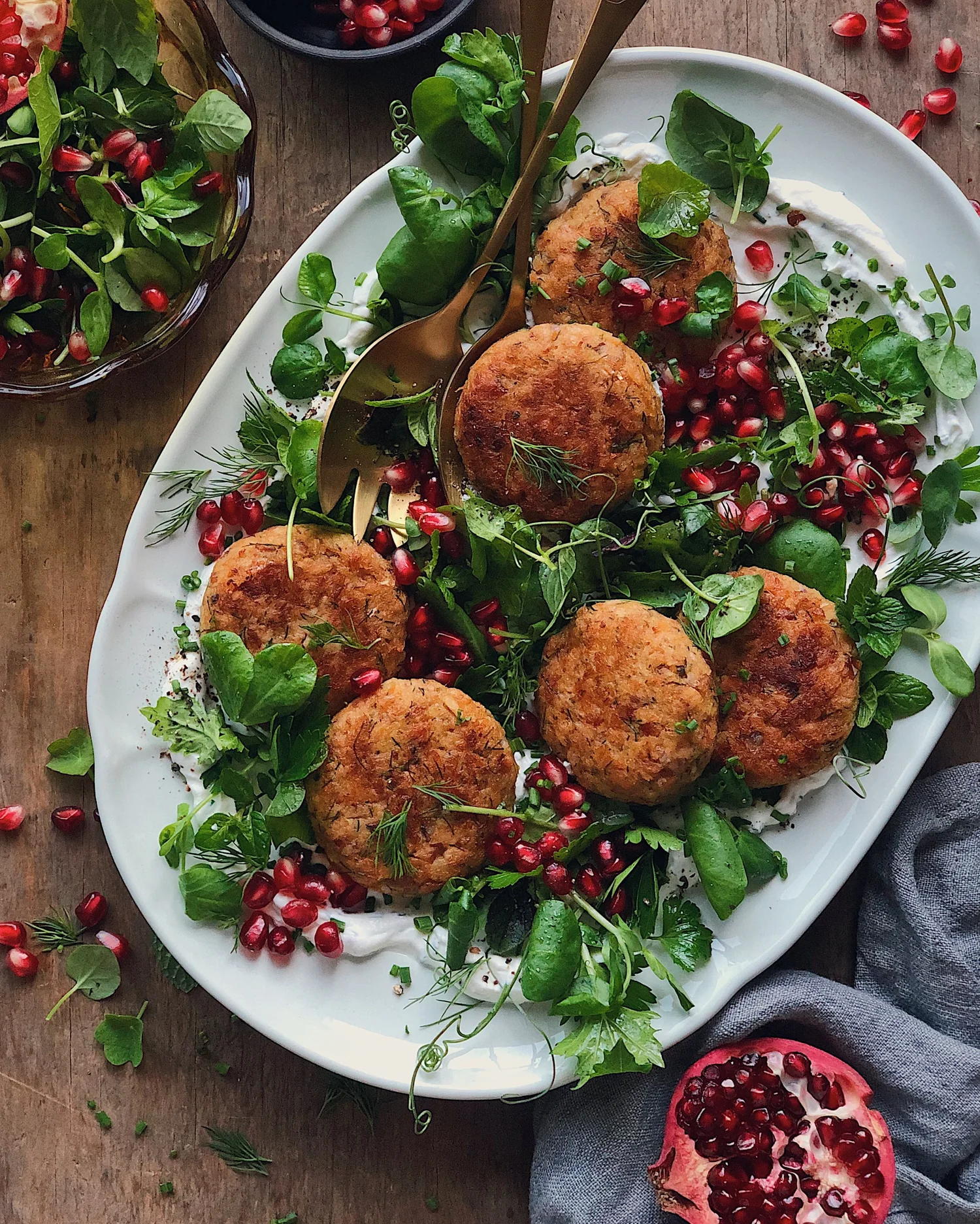 Easy Salmon Cakes on Labneh with Herb and Pomegranate Salad — Lily Morello for Kvaroy Arctic