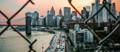 New York skyline through fence