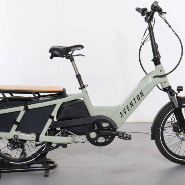 a white Aventon Abound electric cargo bike
