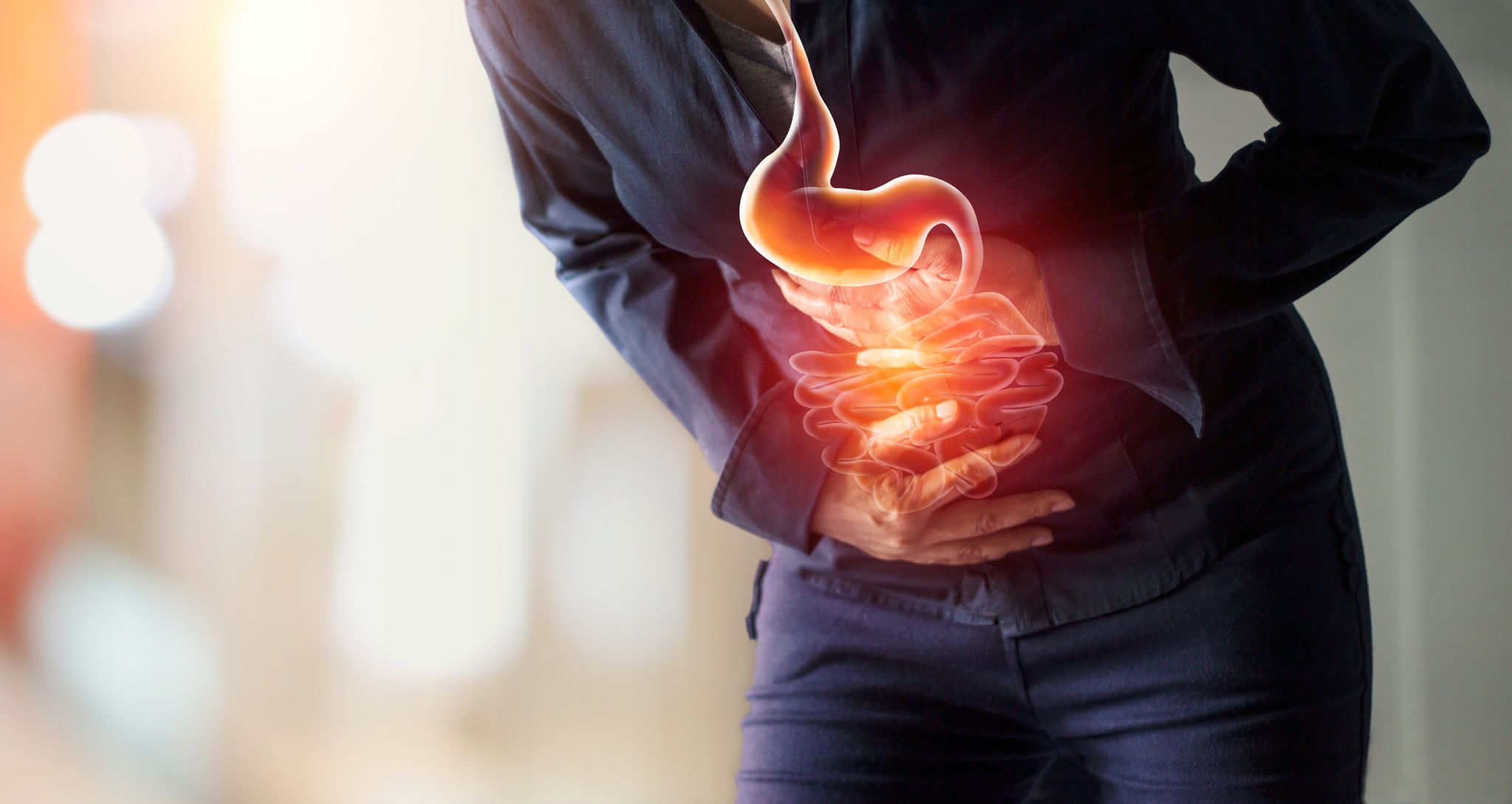Woman touching stomach painful suffering from stomachache causes