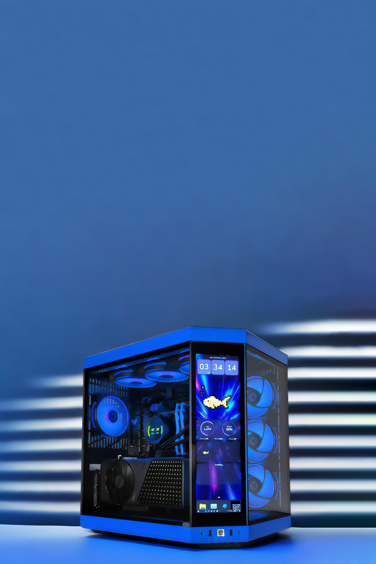 The image showcases a high-end gaming PC with a transparent case illuminated by blue LED lights. The interior components are clearly visible, including multiple fans, a large graphics card, and a CPU cooler. The front panel features an integrated display showing system metrics, time, and an animated fish. The background is a gradient of blue tones, giving the entire setup a futuristic and sleek appearance.