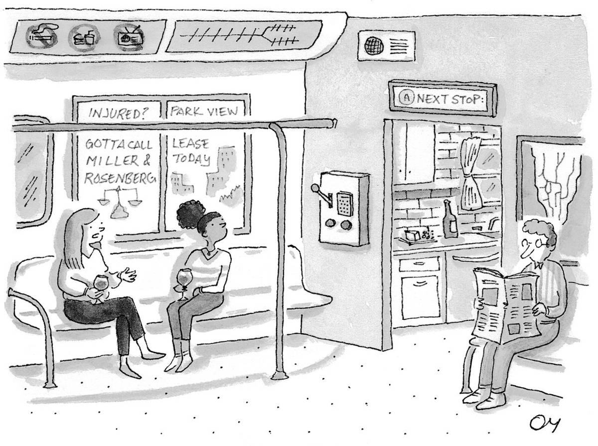 Two women sitting in home that looks like the subway.