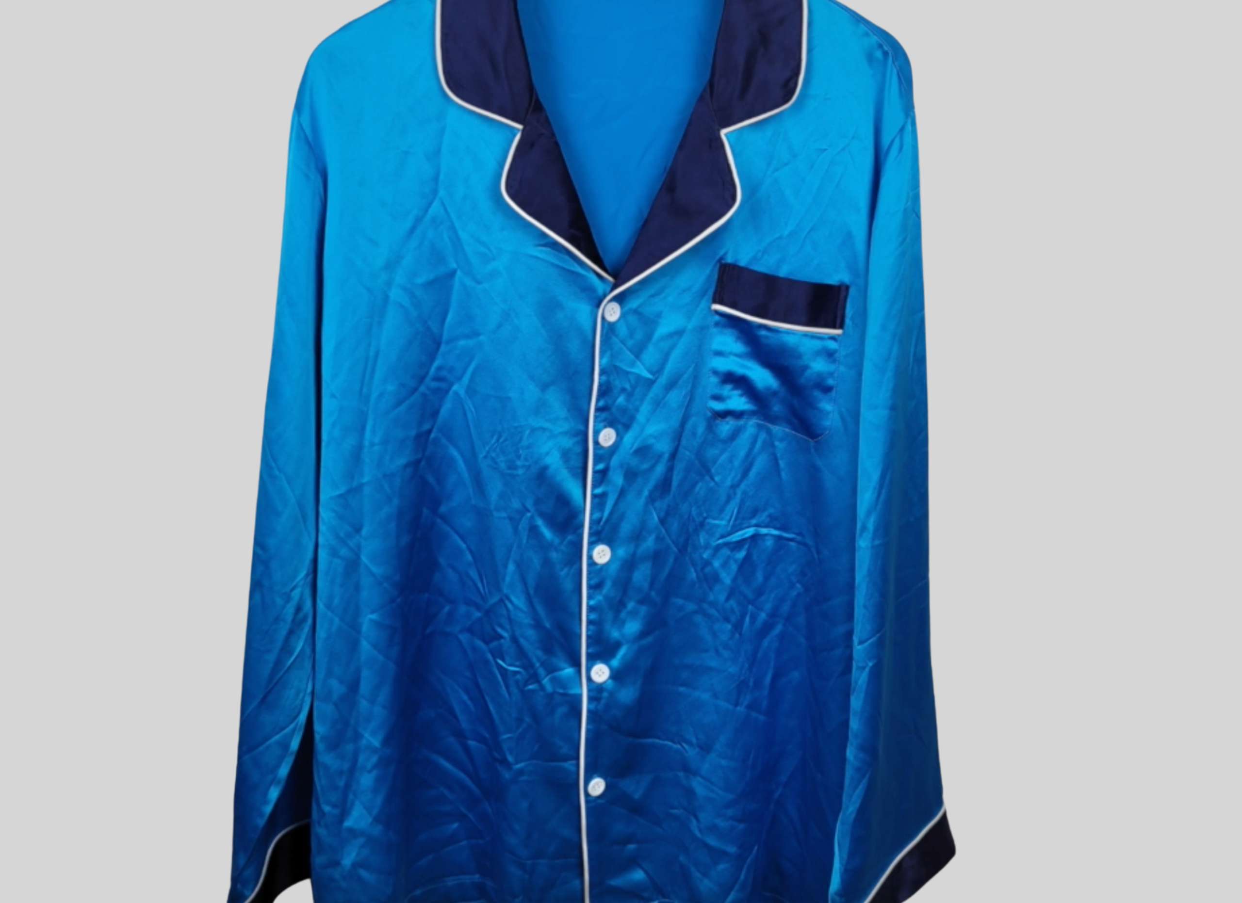 a photo of wrinkled silk pajamas