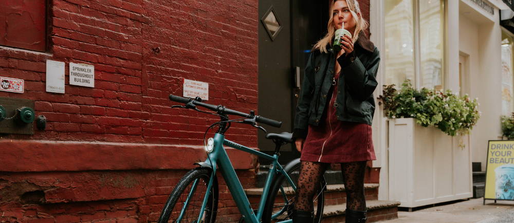 Woman with a Tenways electric hybrid bike