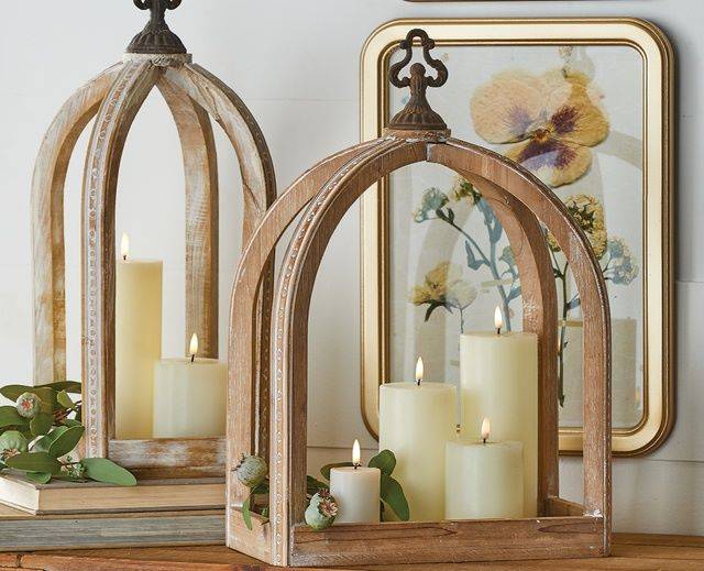natural wood lantern with open style and ivory pillar candles