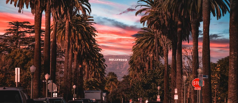 Photo by Jake Blucker on Unsplash of Los Angeles with Hollywood sign in background at sunset