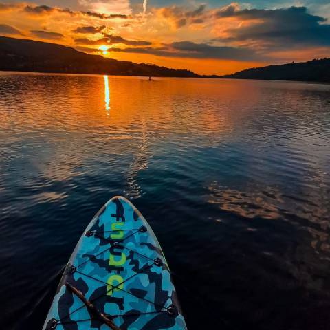 Good quality inflatable stand up paddle board with sunset in Ontario