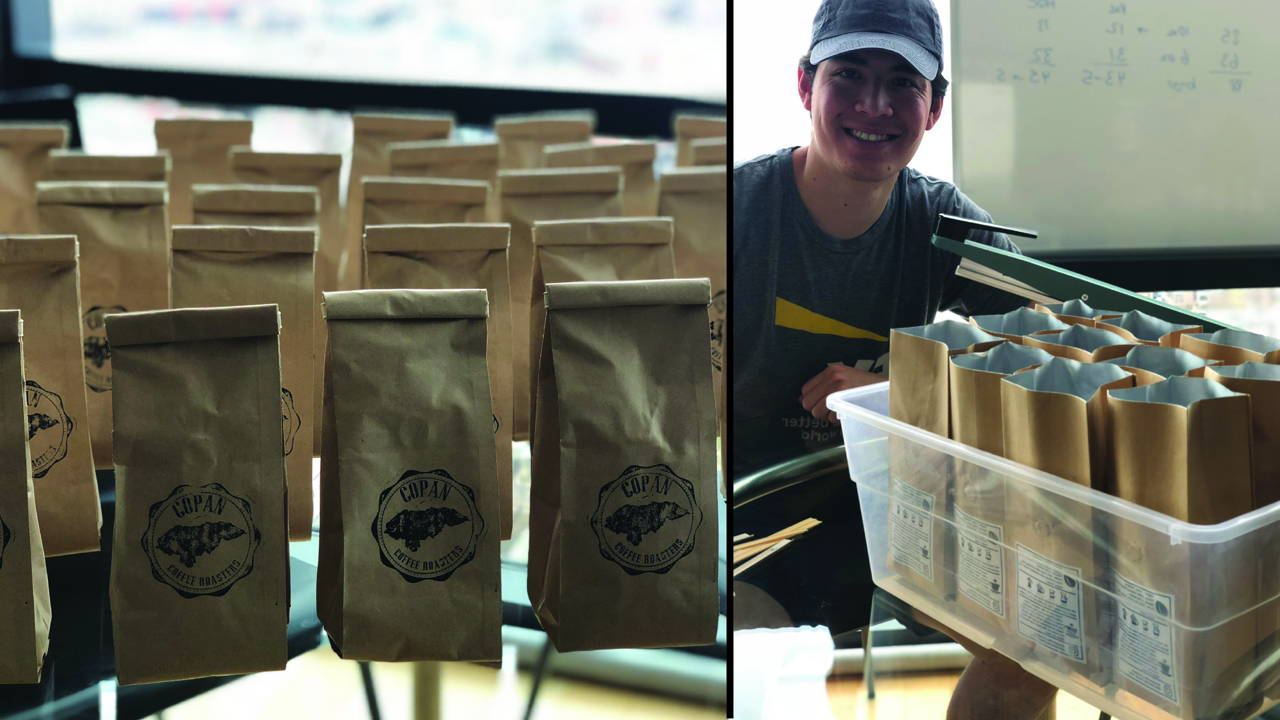 Multiple bags of coffee on left, our company master roaster, Harry, on right.