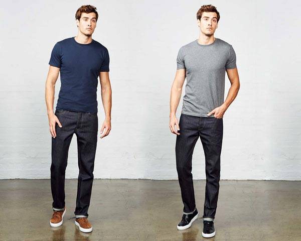 Man wearing organic cotton dark indigo jeans from Hiut Denim