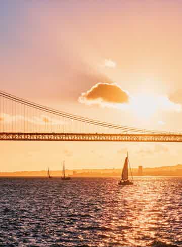 See Belém Tower and other monuments from the water