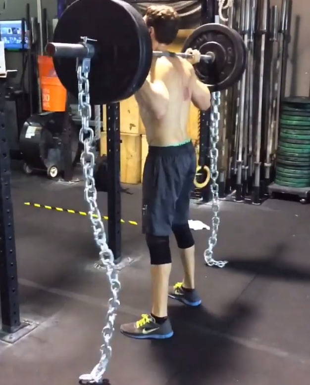 athlete with ader chains at gym