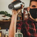 bartender shaking a cocktail