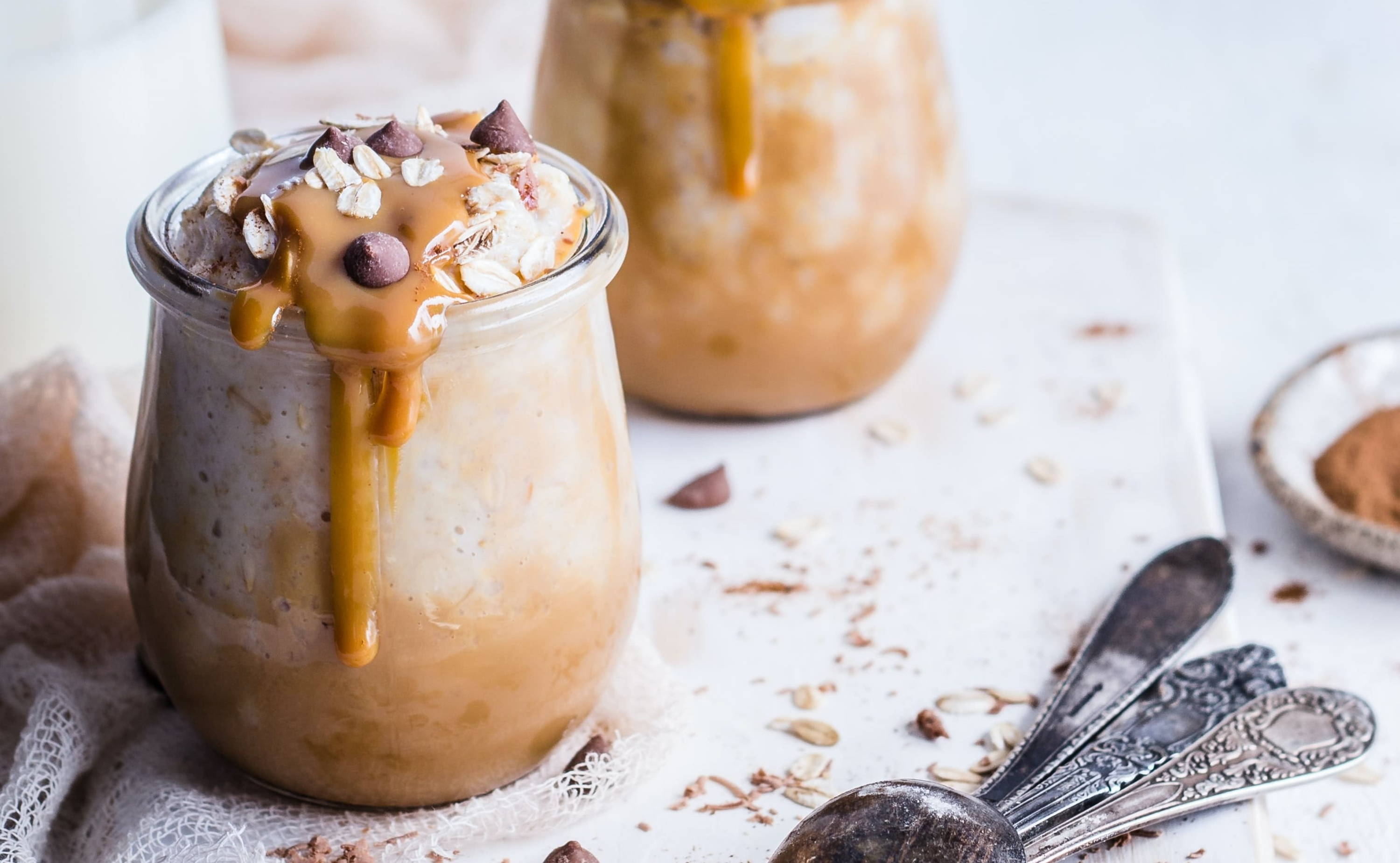 Healthy peanut butter overnight oats with milk chocolate chips and and honey