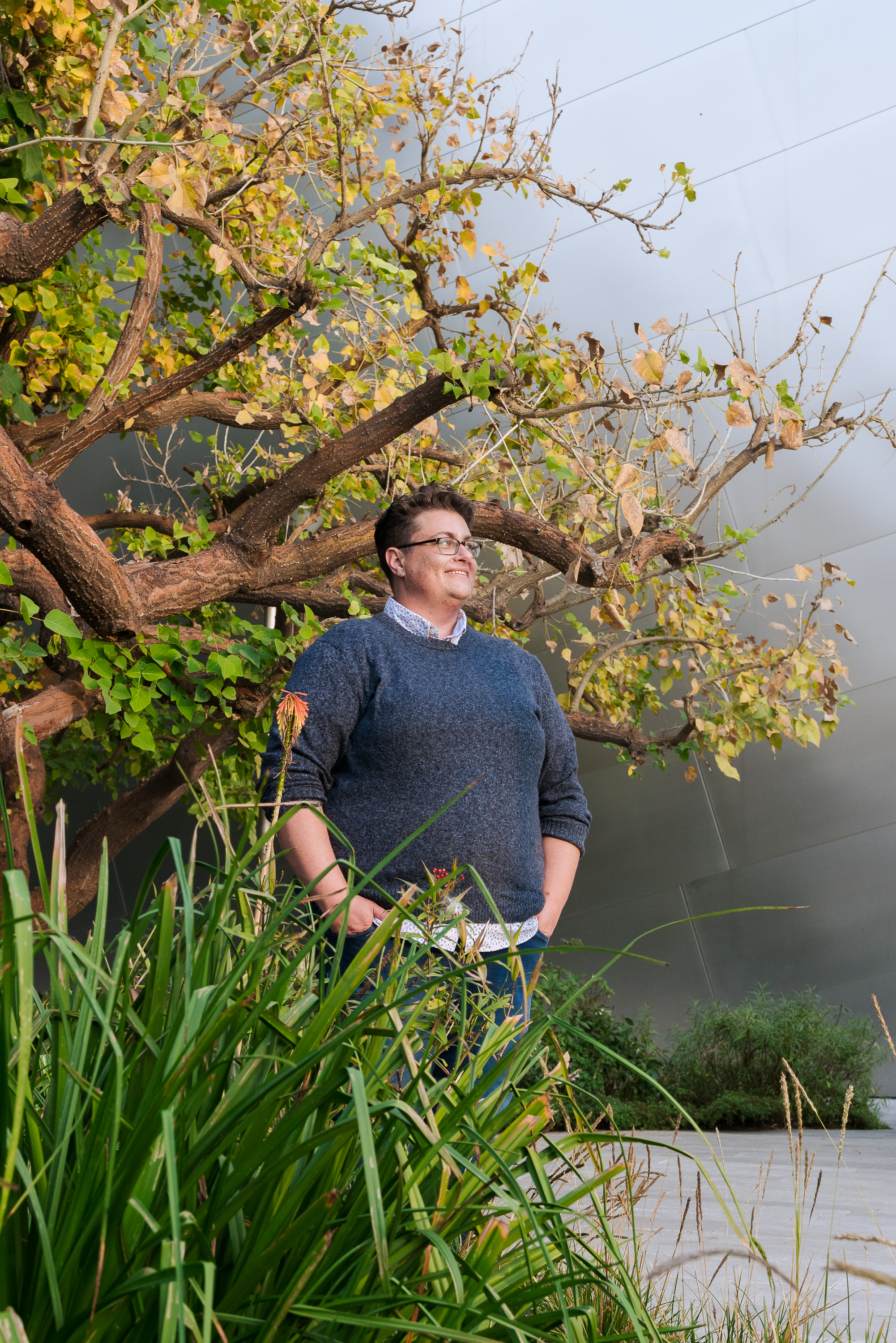 Julian Kehs stands among the greenery of Walt Disney Hall's Blue Ribbon Garden