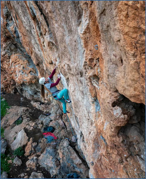 Kim Lucas climbing the classic Mama Mia, F7b+, at Red Balcony Crag