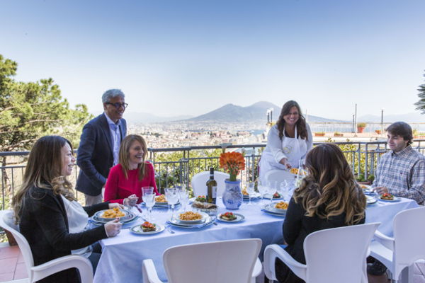 Typical dining experience with cooking demo in Naples
