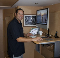 Scott Leonard worked out of his 50-foot catamaran while he sailed the world with his wife and three sons.