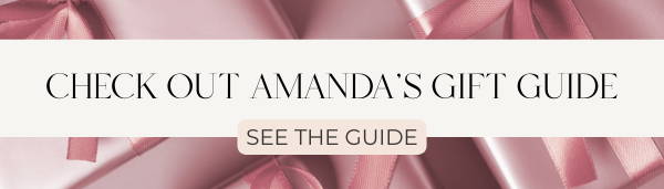 A present covered in vibrant gift wrap, adorned with a stylish ribbon.