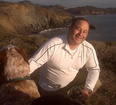Brian Hamburger with Oscar takes a break from the board room meeting.