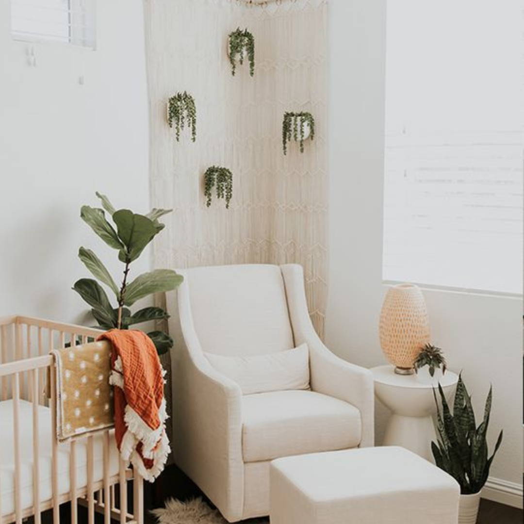 Hanging and pot indoor plants with rocking chair for nursery decor