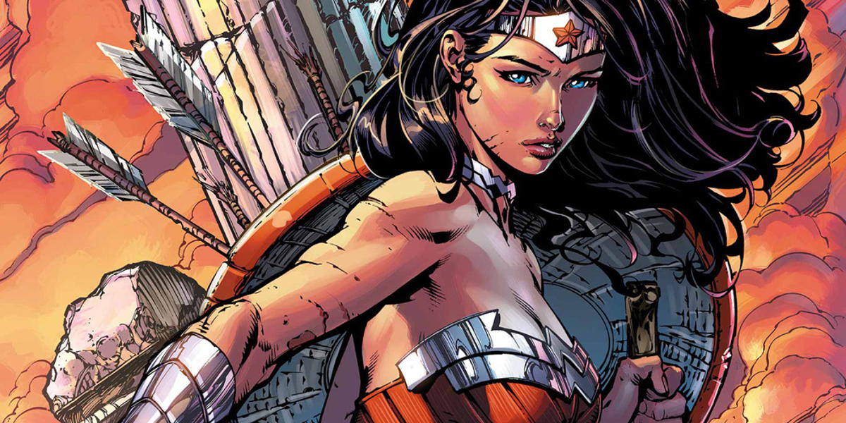 Wonder woman from recent comics holding a shield and looking confidently ahead during a battle.