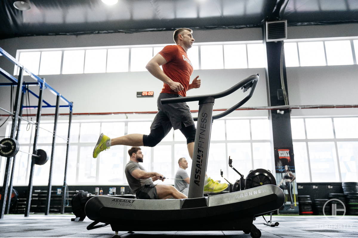 athlete training on treadmill in gym