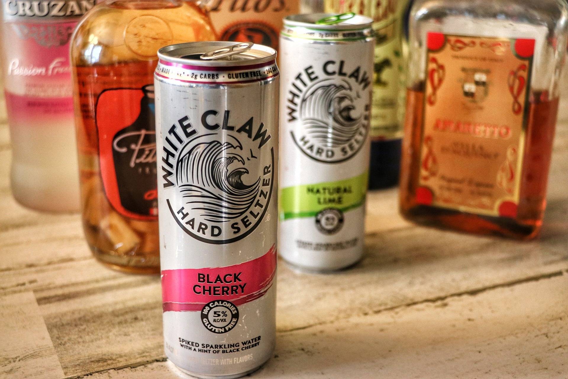 two flavors of white claw seltzer with liquor