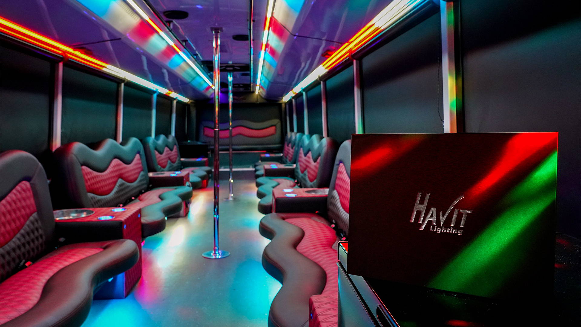 Havit Commercial 120LED RGB IP20 Chasing LED Strip interior in various different colours, illuminating the vibrant vibe of the bus interior