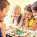 Children playing with the Montessori Number Knockdown game.