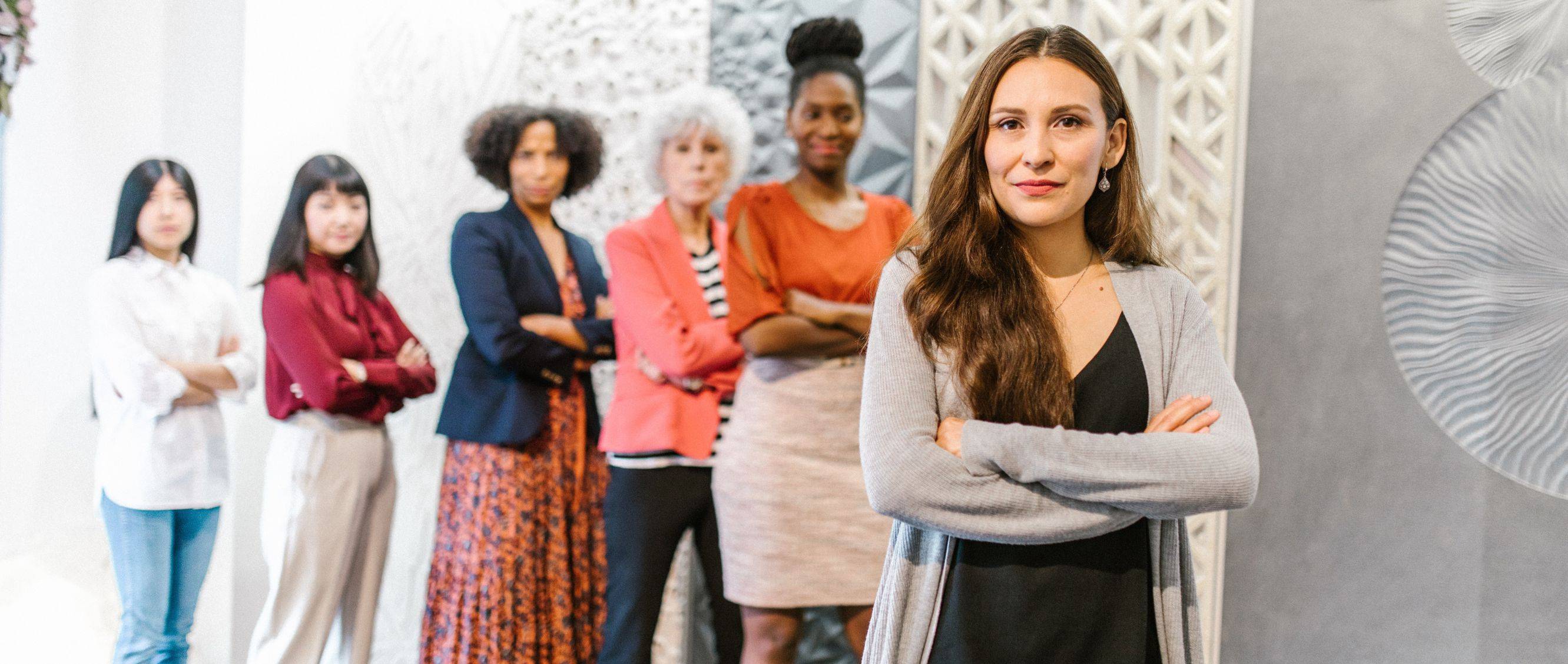6 Confident diverse women standing in a line